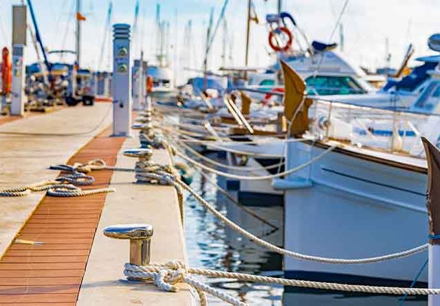 Yachts moored on harbour in Porto Colom on Majorca island, Spain