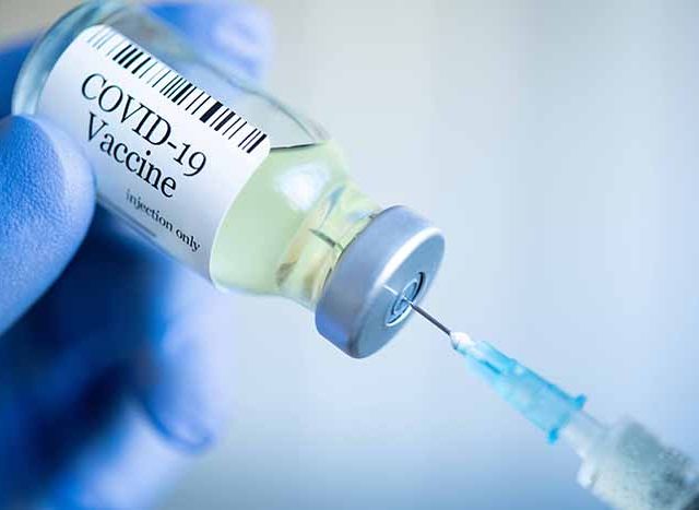 Preparing injection with covid-19 vaccine