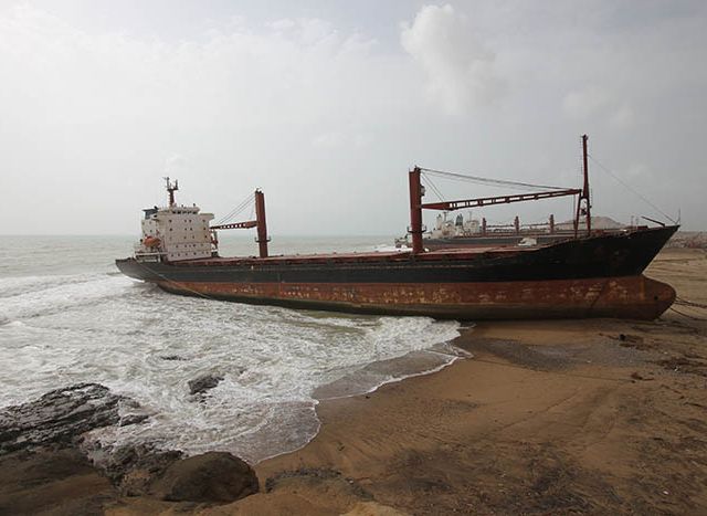 Huge cargo ship run ashore in ship breaking yard