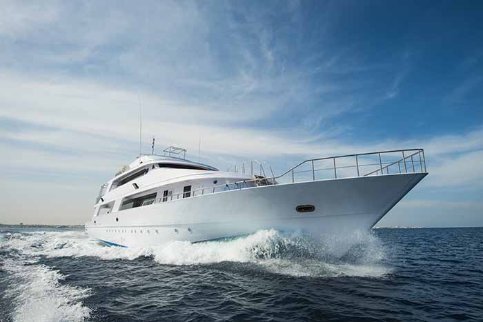 Luxury private motor yacht sailing at sea