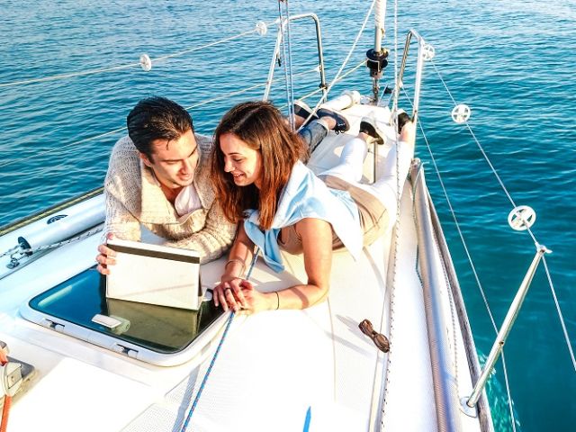 Young,Couple,In,Love,Having,Fun,With,Tablet,Pc,On