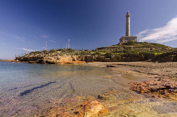 Faro de Cabo de Palos, located on a small peninsula in Cartagena (Murcia) Spain